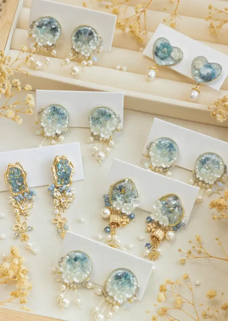 Stylish earrings collection from Kalos Jewellery, including handmade and classic designs