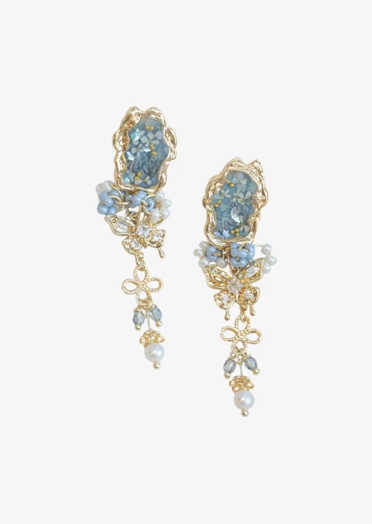 handmade blue resin flower earrings with real preserved flowers, freshwater pearls, and gold-plated accents from the Ethereal Bloom Series